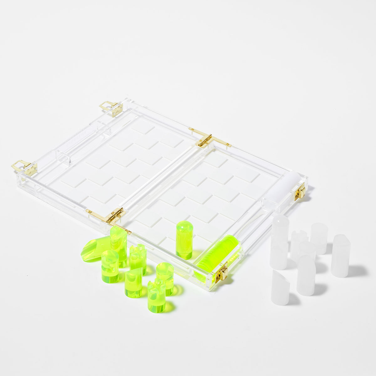 Mini Lucite Chess and Checkers Game in Neon from Sunnylife. 